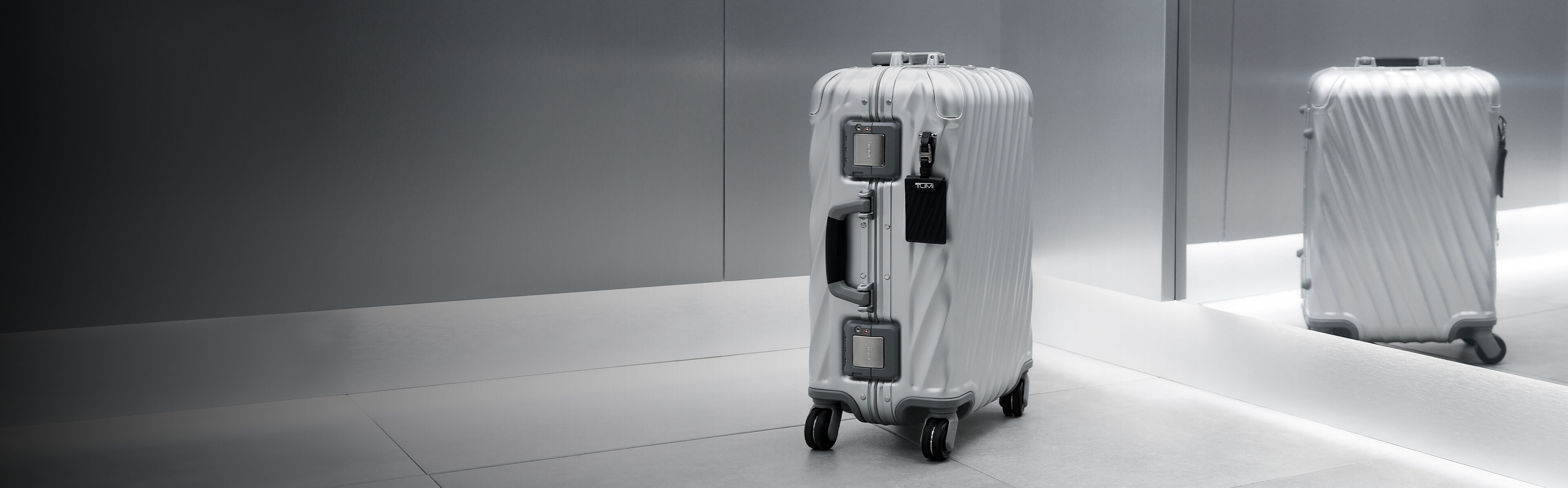 TUMI Warranty Banner